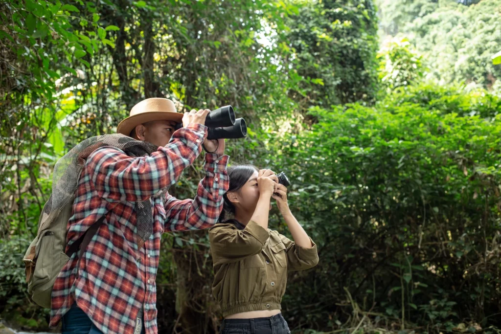 man and girl bird watching