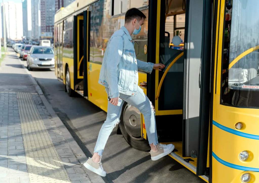 man taking city bus