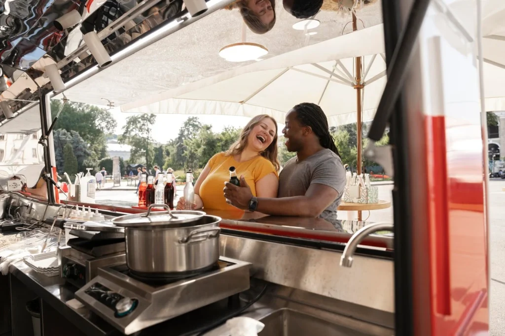 couples buying food in a food truck